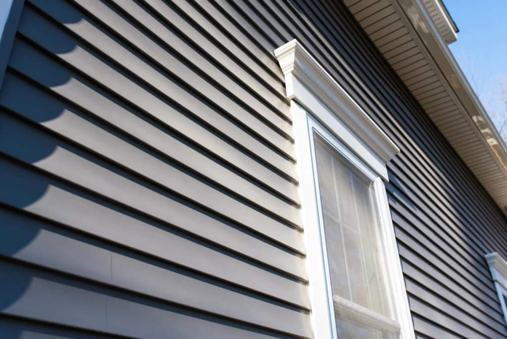 close up view of grey siding installation homeowner diy guide