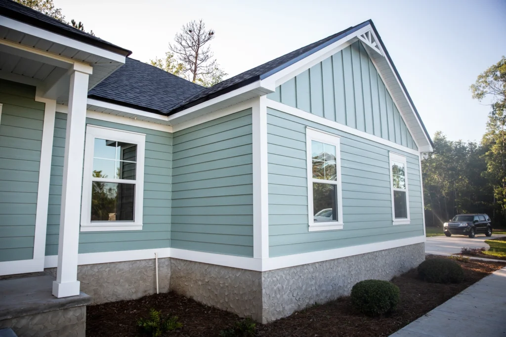 side view of residential home in minneapolis mn with professional siding installation