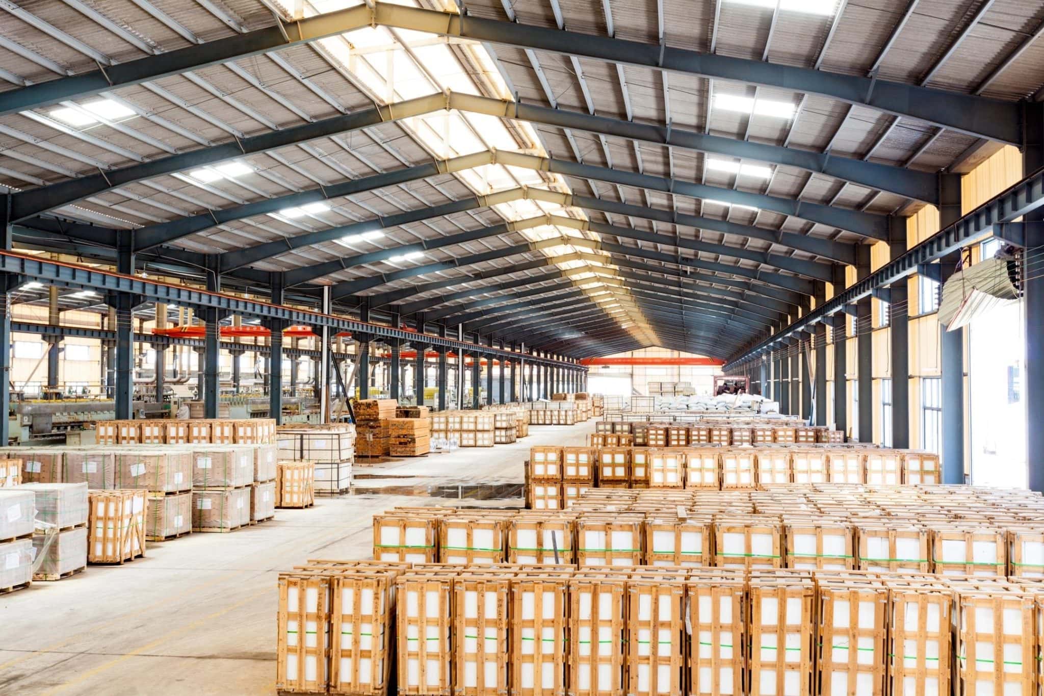 Large pole shed with crates in it