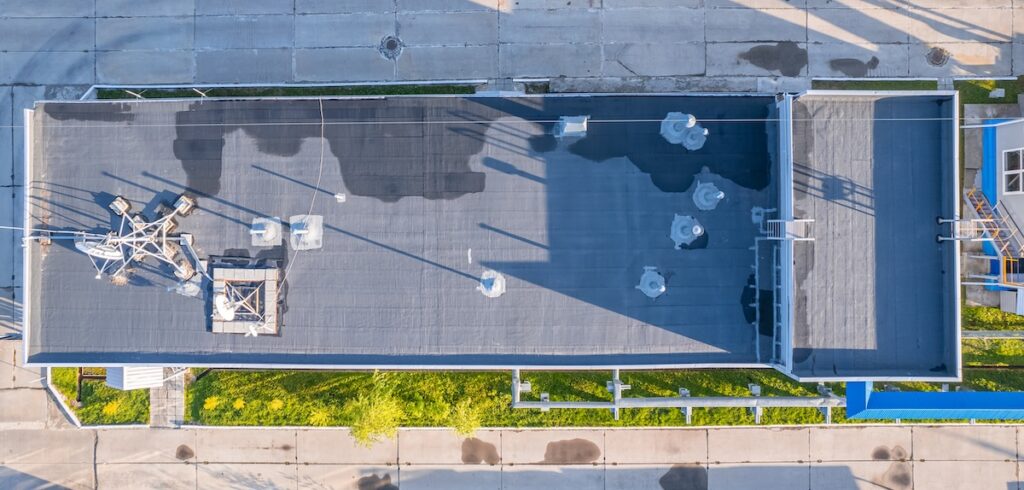 apartment builiding with water on roof