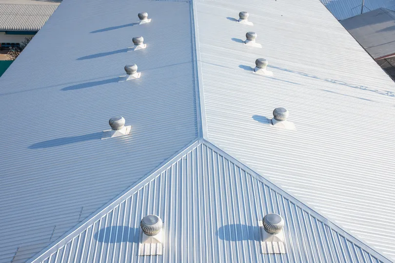 Light blue and gray commercial roof in Hudson