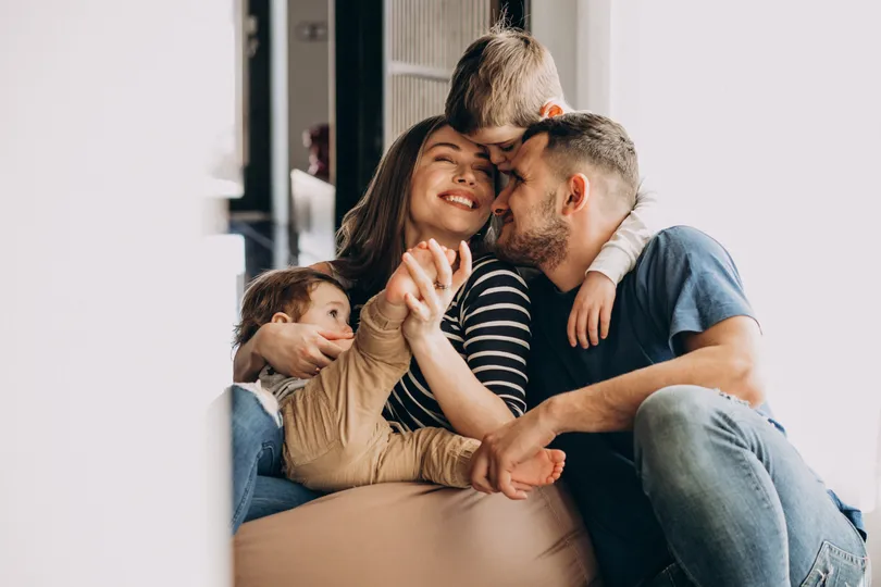 Homeowner family hanging out together in their Lino Lakes house