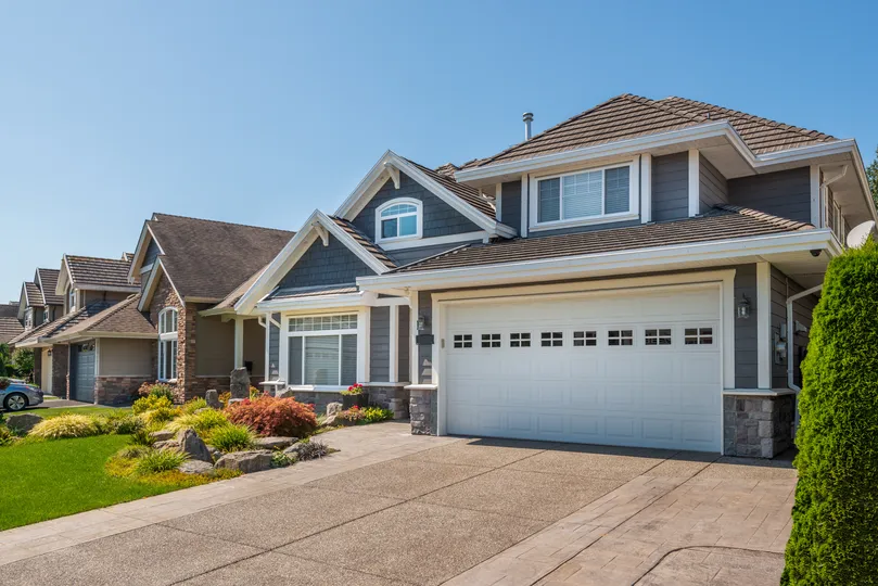 Lino lakes house with a garage and driveway