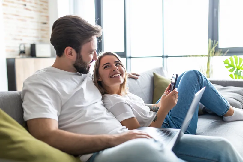 Couple sitting together in their home in Edina