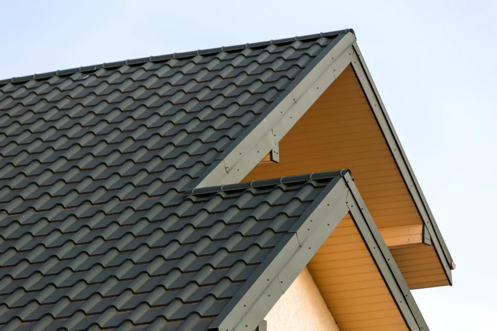dark metal roofing system installed on hugo home