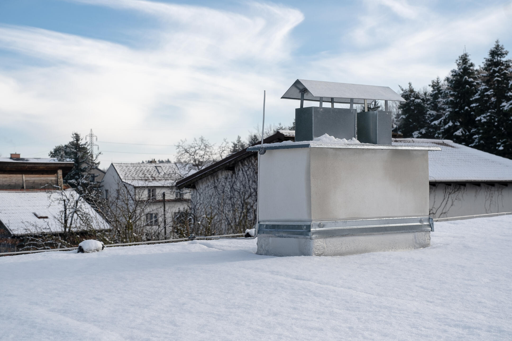 how much snow can a flat roof hold-flat residential roof covered in snow