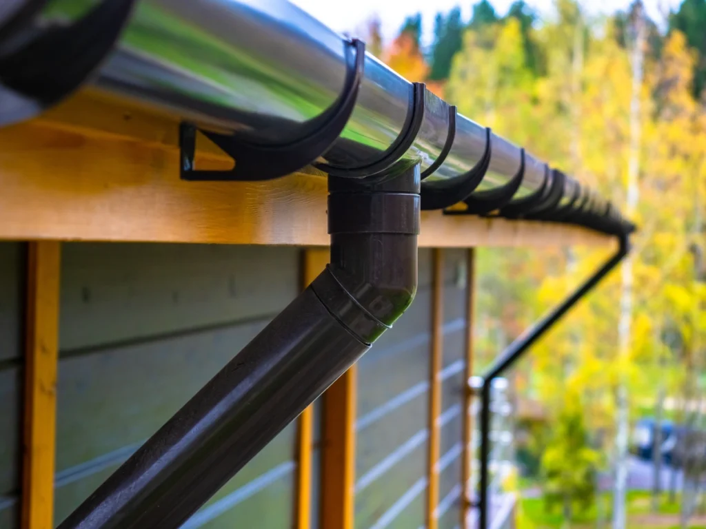 black metal gutters on house