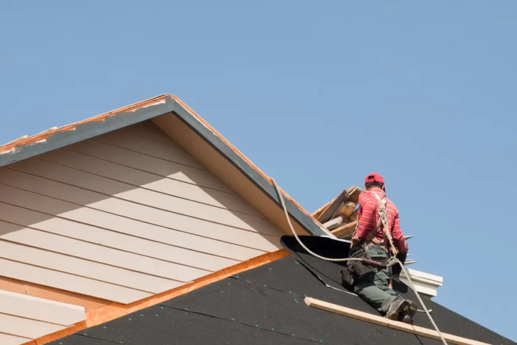 roofer replacing a roof