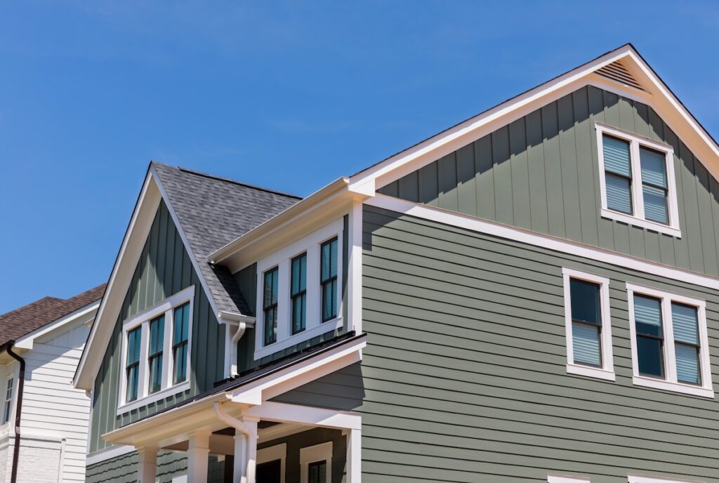 Sage green siding on residential home