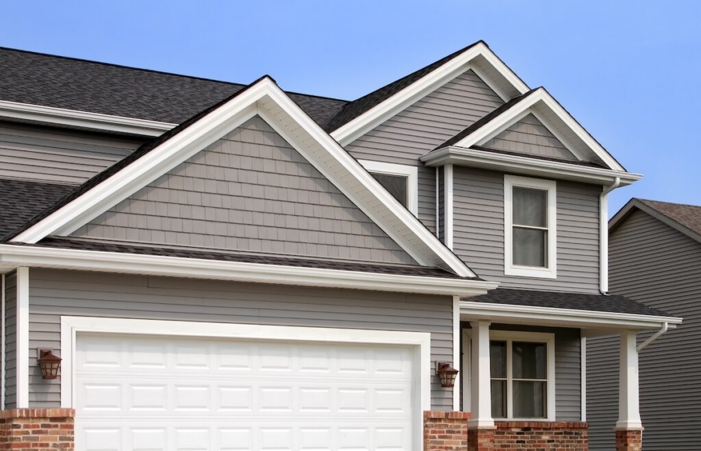 Dark brown vinyl siding on residential home