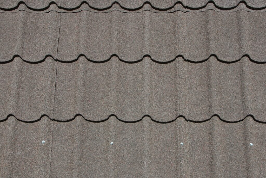 Photo of stone coated and ceramic roof tiles reflects heat well.